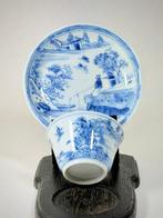 Theekop en schotel, meester van de rotsen - Porselein -