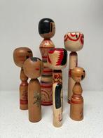 Een prachtige verzameling vintage Kokeshi in verschillende