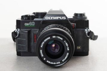 Olympus OM40 Program + Zuiko Auto-Zoom 3,5-4,5/35-70mm, Audio, Tv en Foto, Fotocamera's Analoog, Nieuw