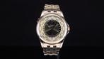 Patek Philippe - World Time - 5130/1G-010 - Heren -, Handtassen en Accessoires, Horloges | Heren, Nieuw