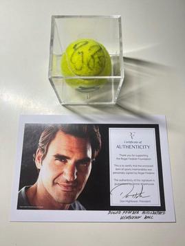 Own a Piece of Tennis History: Autographed Wimbledon Ball by Roger Federer for Sale!
