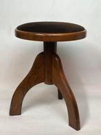 Tabouret - Bois - Un tabouret de piano vintage.