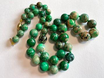 18 carats (750) or - Jaspe impérial de sédiments marins. -