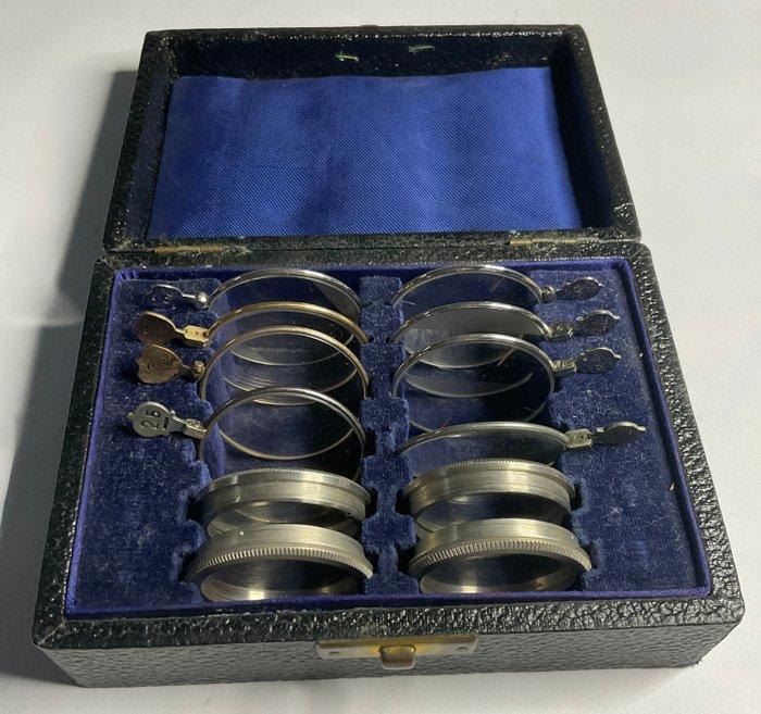 Medische apparatuur - Opticien proeflenzen en King Hurst, Antiquités & Art, Antiquités | Assiettes décoratives & Carrelages