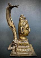 Mukhaliga, het gezicht van iva onder de Nga. -