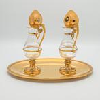 Ampoules dans une valise, en laiton. - Cristal - 1850-1900