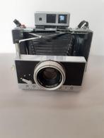 Polaroid 180 Land camera con Tomioka Tominon 4.5/114mm |