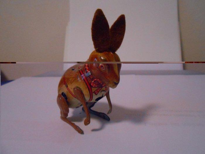 Köhler - Huppelend Konijn - Opwindbaar blikken speelgoed -, Antiek en Kunst, Antiek | Speelgoed