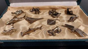 Messensteun (12) - animaux - Verguld brons