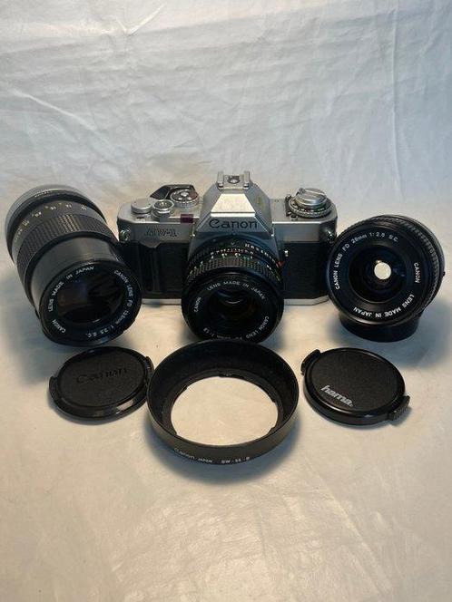 Canon AV-1 + 50 mm + 28 mm + 135 mm Single lens reflex, Audio, Tv en Foto, Fotocamera's Analoog