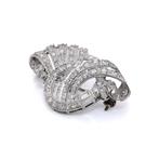 Broche Broche vintage en diamants avec un design en scroll