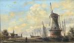 Dutch School (XIX) - A Dutch harbour scene with windmills